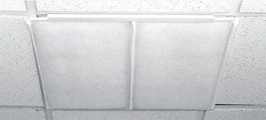 Two panels of a drop ceiling are fitted with Breathe Easy – Diffuser Air Filters.