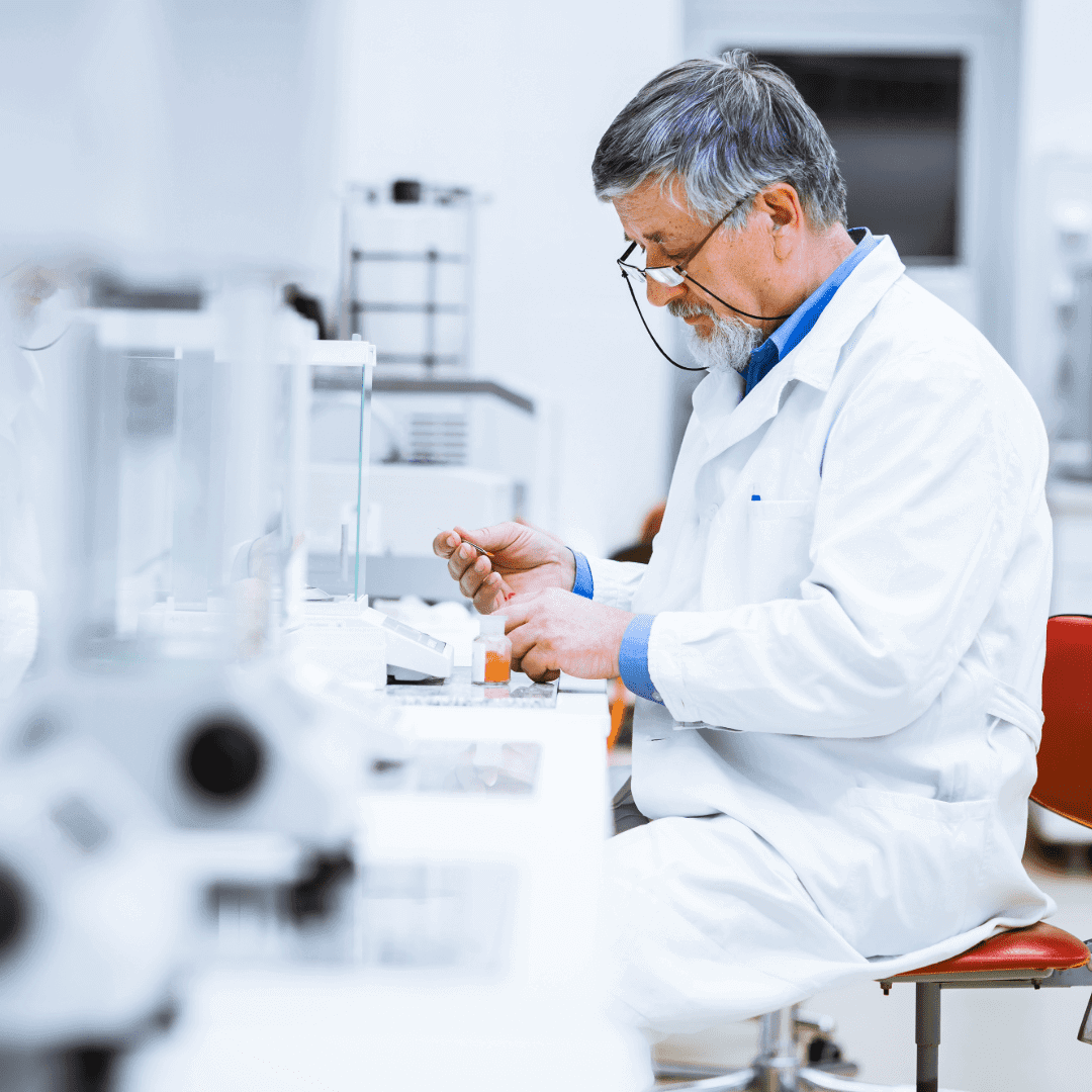 Scientist working in a laboratory setting.